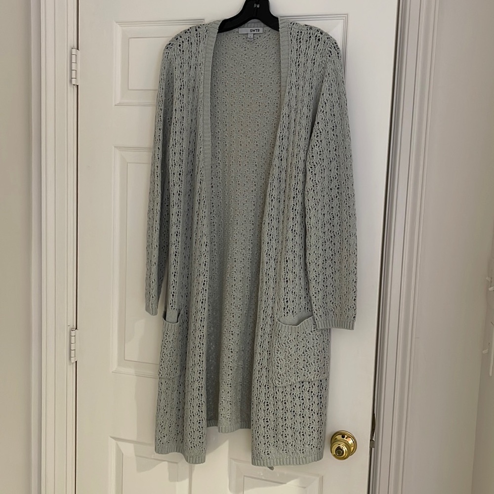 Fabulous long light weight topper,loose knit, light weight